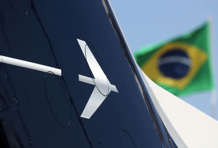 The logo of Brazilian aviation company Embraer is seen during the Latin American Business Aviation Conference & Exhibition fair (LABACE) at Congonhas Airport in Sao Paulo, Brazil August 14, 2018. REUTERS/Paulo Whitaker