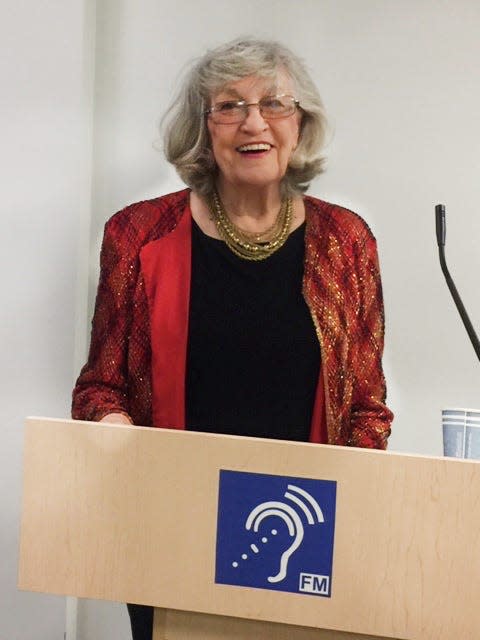 Noreen Renier speaking at a library in Fairfax County, Virginia, in December 2021.