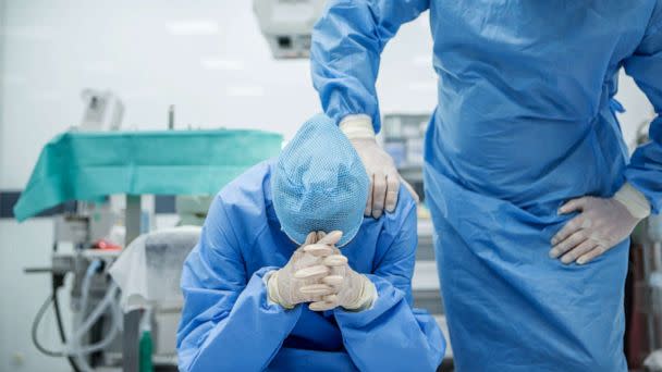 PHOTO: A doctor is consoled in this stock photo. (STOCK PHOTO/Getty Images)