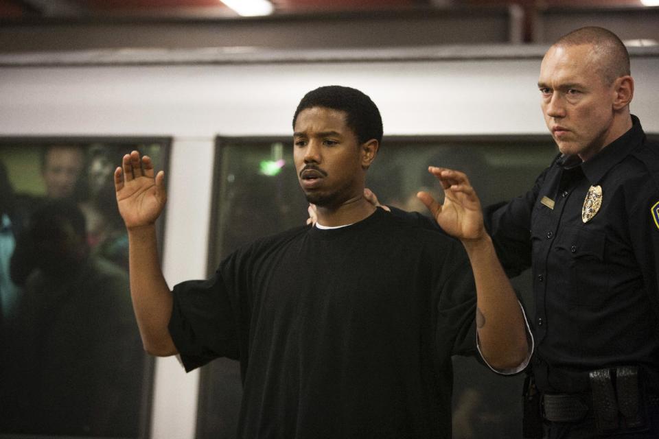 This publicity photo released by The Weinstein Company shows Michael B. Jordan, left, and Kevin Durand, right, in a scene from the film, "Fruitvale Station." (AP Photo/The Weinstein Company, Ron Koeberer)