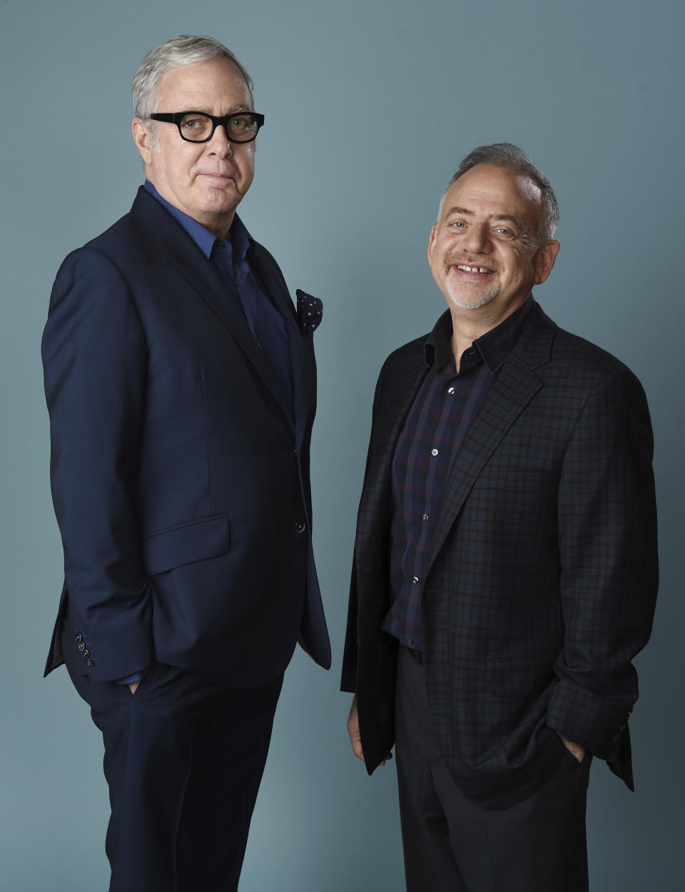 FILE - In this Nov. 28, 2018 file photo, Scott Wittman, left, and Marc Shaiman, co-songwriters for the film "Mary Poppins Returns," pose for a portrait at the Montage Beverly Hills, in Beverly Hills, Calif. On Tuesday, Jan. 22, the duo were nominated for an Oscar for best original song for "The Place Where Lost Things Go." (Photo by Chris Pizzello/Invision/AP, File)