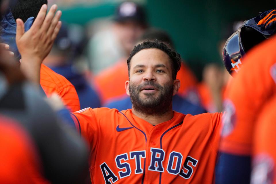 Jose Altuve celebrates a home run against the Nationals.