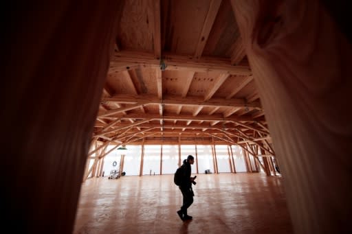 The Village Plaza nods to traditional Japanese wood buildings, but incorporates novel structures, including an arch frame structure