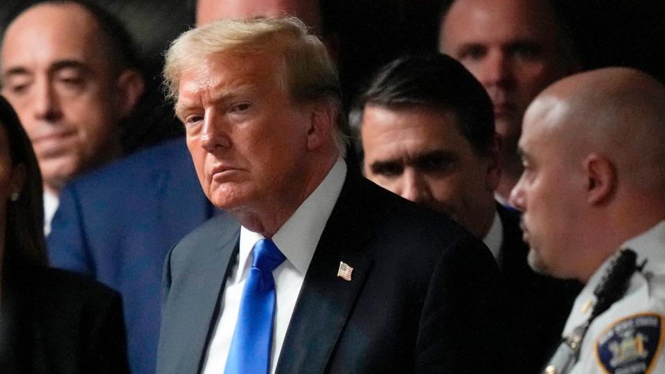 PHOTO: Donald Trump walks out of the courtroom to make comments to members of the media after a jury convicted him of felony crimes for falsifying business records in a scheme to illegally influence the 2016 election, May 30, 2024, in New York. (Seth Wenig/AP)