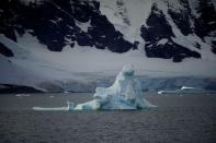 FILE PHOTO: An iceberg floats near Orne Harbour, Antarctica, Feb. 15, 2018. Reuters/Alexandre Meneghini/File Photo