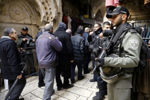 Israeli police keep a watchful eye on Palestinians headed to the main weekly prayers at Jerusalem's flashpoint Al-Aqsa mosque