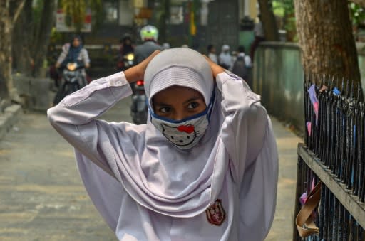 People have been told to wear face masks to protect them from the smog