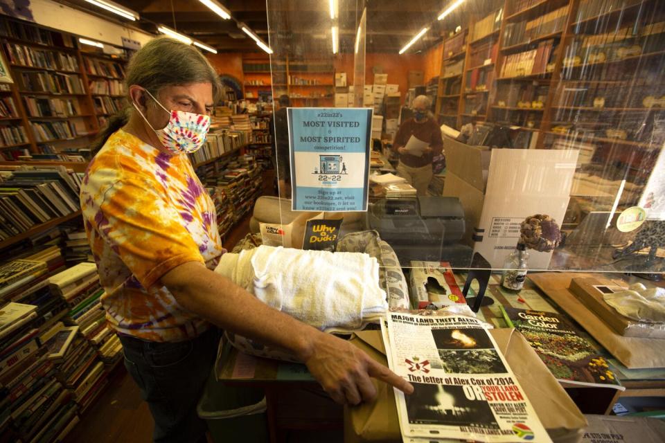 Inside the Iliad, Dan Weinstein points to a flyer.