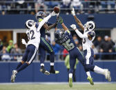 <p>Cornerback Troy Hill #32 of the Los Angeles Rams knocks away a pass as wide receiver Paul Richardson #10 of the Seattle Seahawks and Tyler Lockett #16 try to make the completion during the 2nd quarter of the game at CenturyLink Field on December 17, 2017 in Seattle, Washington. (Photo by Otto Greule Jr /Getty Images) </p>