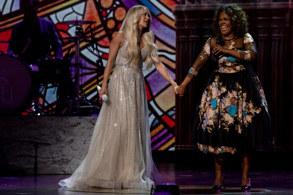 Carrie Underwood and CeCe Winans perform together at the Grand Ole Opry House during the filming of their performance for the 56th Academy of Country Music Awards on Saturday, April 17, 2021 in Nashville, Tenn.