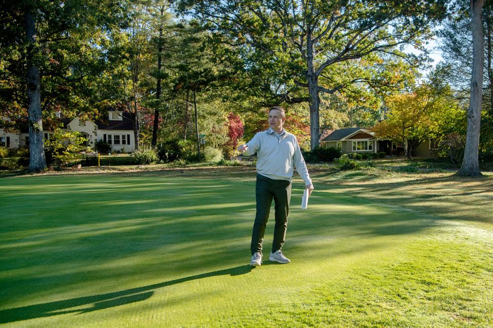 Mike Bennett, one of the operators with Commonwealth Golf Partners, on the putting green of the 13th hole at Asheville Municipal Golf Course, October 18, 2023. Bennett and his team are working to bring the course closer to its original Donald Ross Design from 1927.