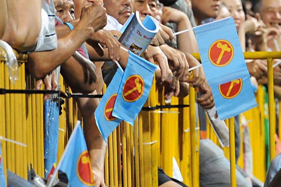 Workers’ Party supporters seen at a rally in 2011. (PHOTO: Getty Images)