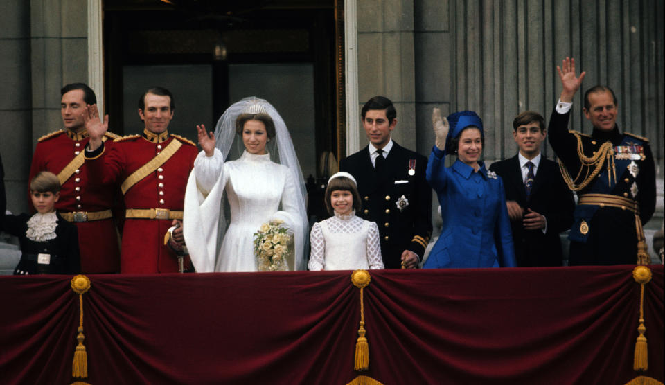 LONDON - NOVEMBER 14: Princess Anne, Princess Royal and Mark Phillips (3rd from left) wave from the balcony of Buckingham Palace following their wedding with Prince Edward, Earl of Wessex (L), Prince Charles, Prince of Wales (4th from right), Queen Elizabeth II (3rd from right), Prince Andrew, Duke of York (2nd right) and Prince Philip, Duke of Edinburgh on November 14, 1973 in London, England.  (Photo by Anwar Hussein/Getty Images)