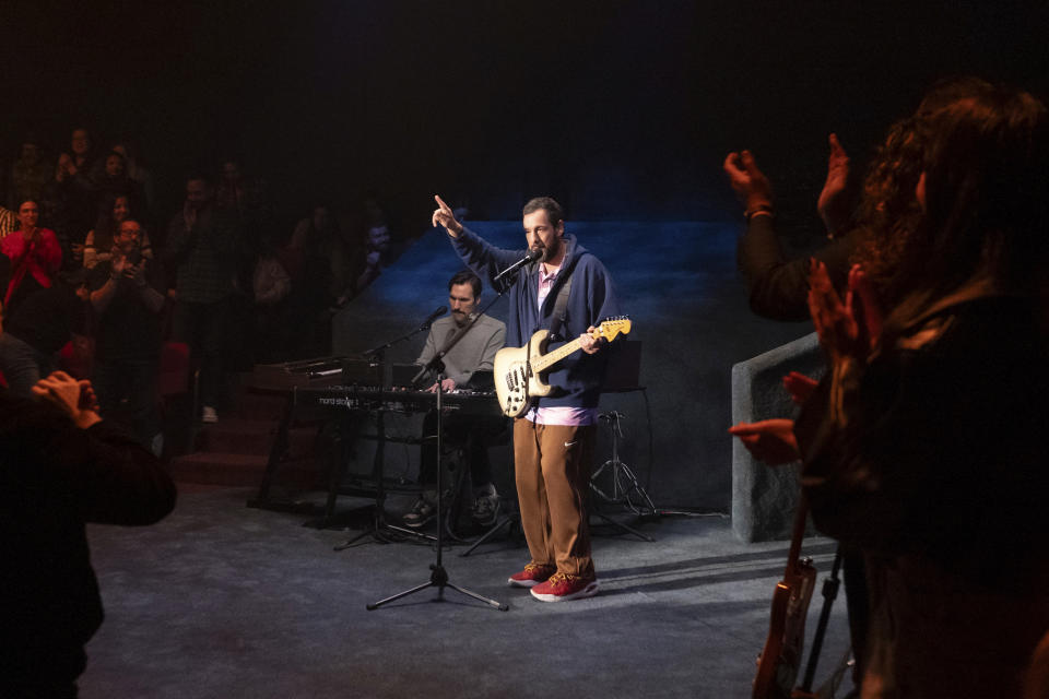 This image released by Netflix shows Adam Sandler during the taping of his comedy special "Adam Sandler: Love You" at the Nocturne Theater in Glendale, Calif. (Scott Yamano/Netflix via AP)