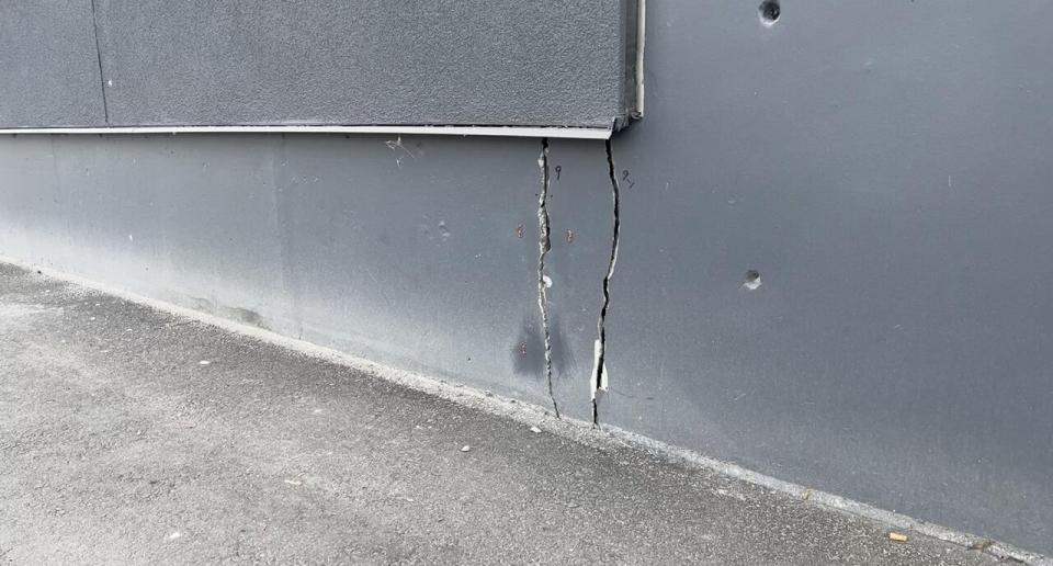 There are cracks on the inside and outside walls of the subsidized housing apartment complex that is less than one year old.