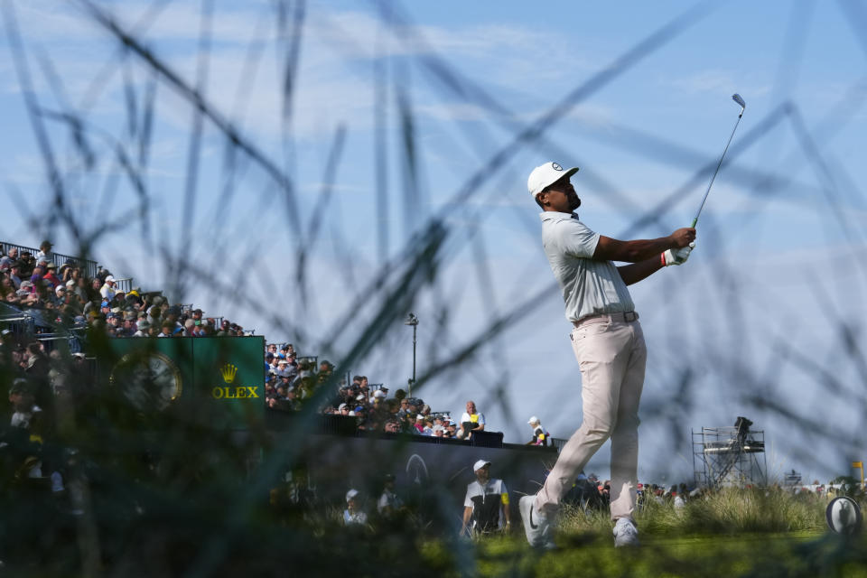 United States' Tony Finau plays his tee shot on the 9th on the first day of the British Open Golf Championships at the Royal Liverpool Golf Club in Hoylake, England, Thursday, July 20, 2023. (AP Photo/Jon Super)