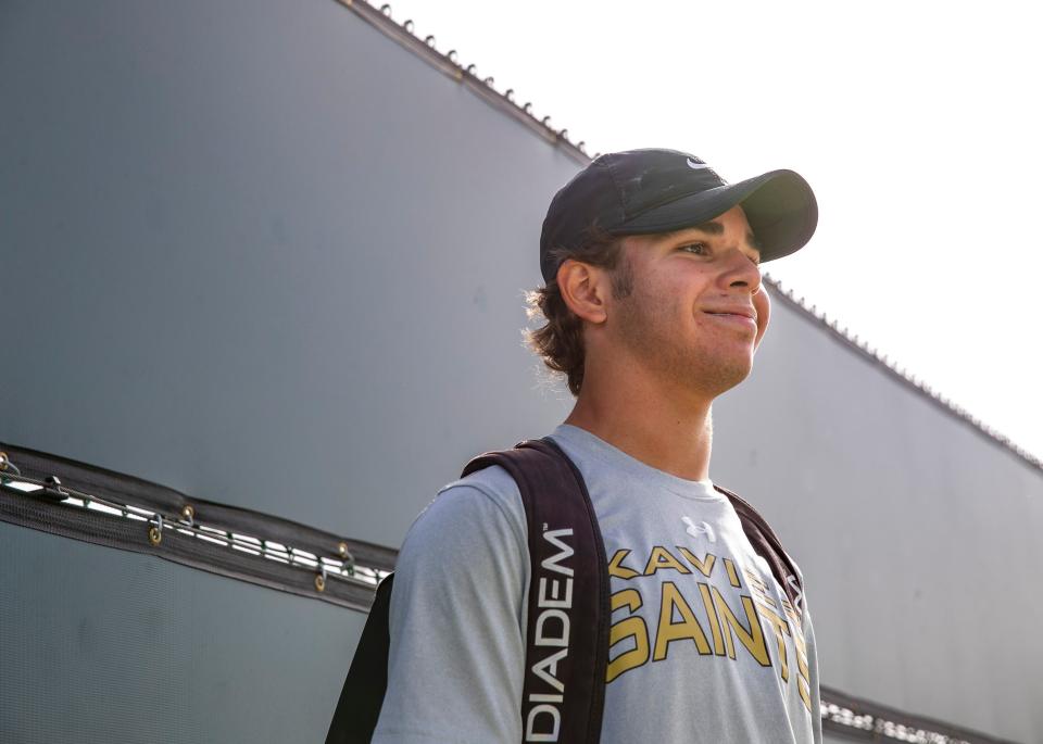 Xavier's Caleb Kassinove talks to members of the media after winning the singles final during the boys' DEL tennis finals in Indian Wells, Calif., Thursday, April 25, 2024.