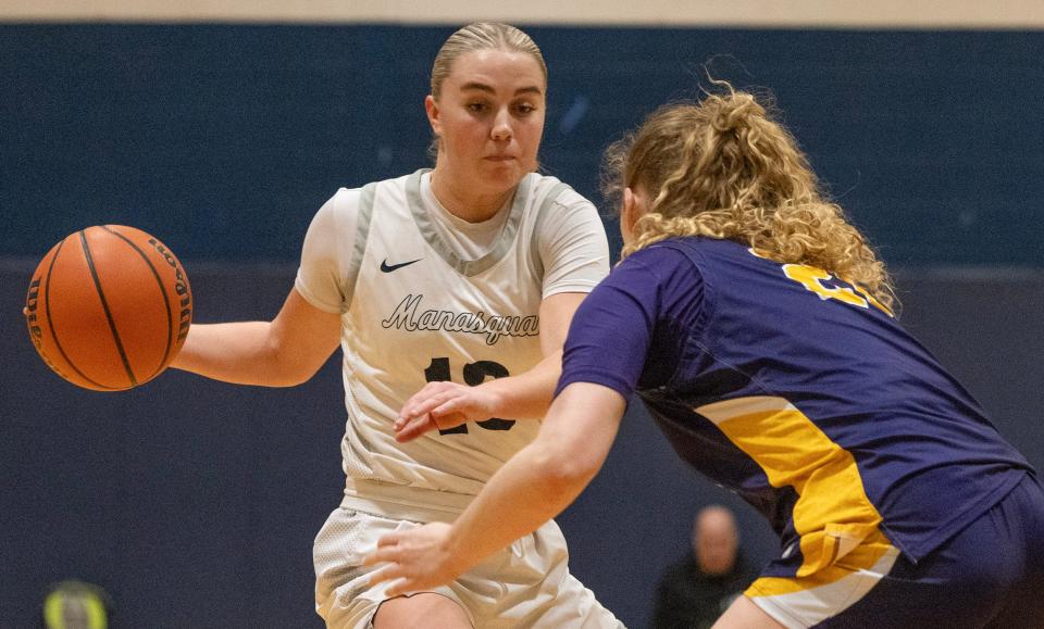 Manasquan’s Hope Masonius looks to drive past St. Rose Jada Lynch in first half action. St. Rose Girls Basketball vs Manasquan SCT Quarterfinal game in Middletown, NJ on February, 10 2024