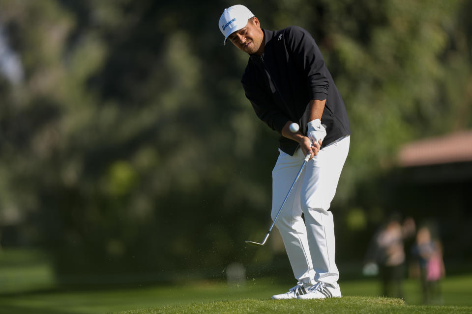 Xander Schauffele watches his third shot on the sixth hole of the La Quinta Country Club course during the first round of the American Express golf tournament, Thursday, Jan. 18, 2024, in La Quinta, Calif. (AP Photo/Ryan Sun)