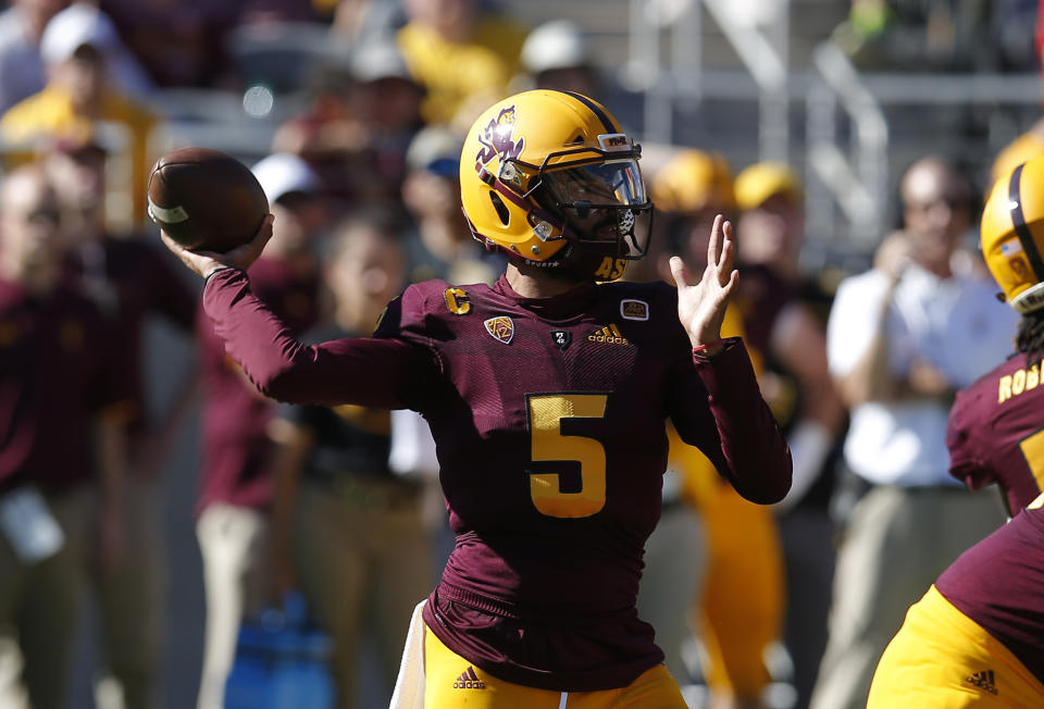 Arizona State quarterback Manny Wilkins throws downfield against Utah in the first half during an NCAA college football game, Saturday, Nov. 3, 2018, in Tempe, Ariz. (AP Photo/Rick Scuteri)