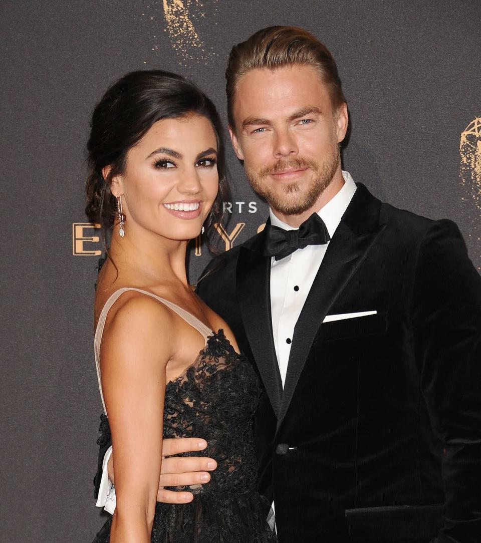 <p>Erbert joined the <em>DWTS</em> troupe in season 21, met Hough (another pro dancer on the show at the time), and the two hit it off. The pair have been together since 2015, and got <a href="https://people.com/tv/derek-hough-hayley-erbert-engaged/" rel="nofollow noopener" target="_blank" data-ylk="slk:engaged" class="link ">engaged</a> in June 2022.</p>