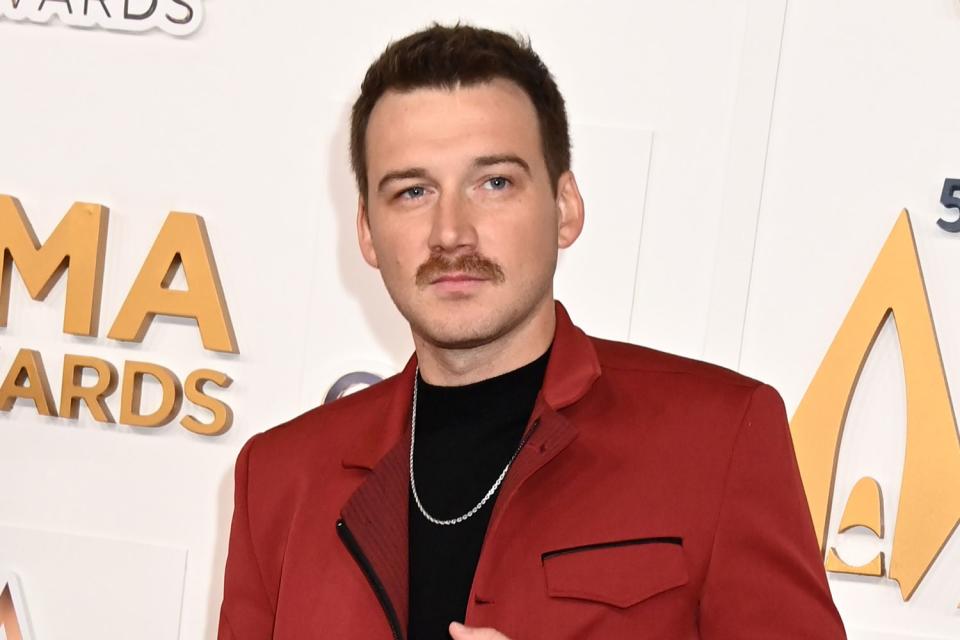 <p>AFF-USA/Shutterstock</p> Morgan Wallen at the CMA Awards in Nashville in November 2023