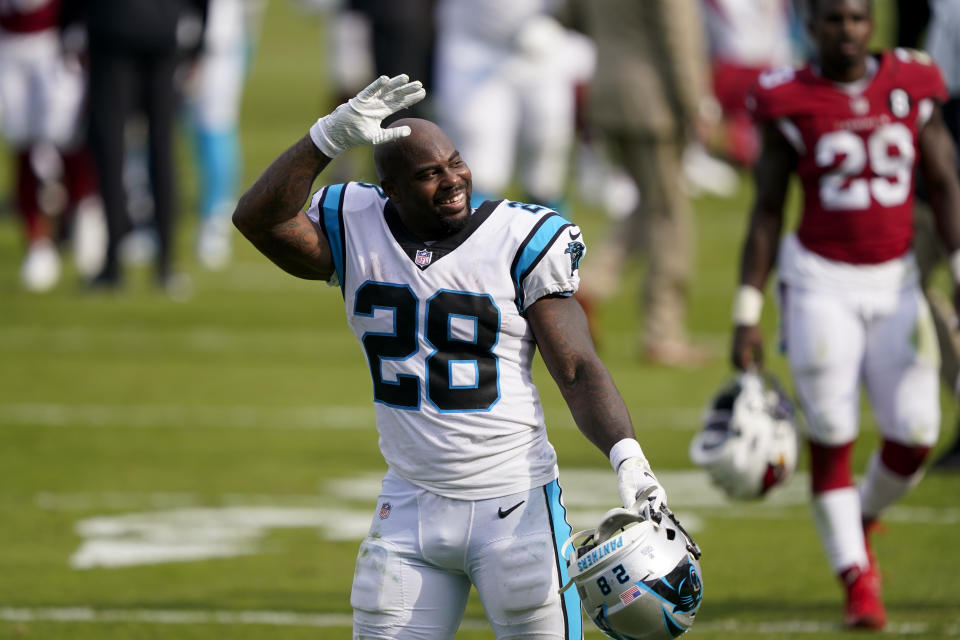 Carolina Panthers running back Mike Davis waves after their win against the Arizona Cardinals during an NFL football game Sunday, Oct. 4, 2020, in Charlotte, N.C. (AP Photo/Brian Blanco)