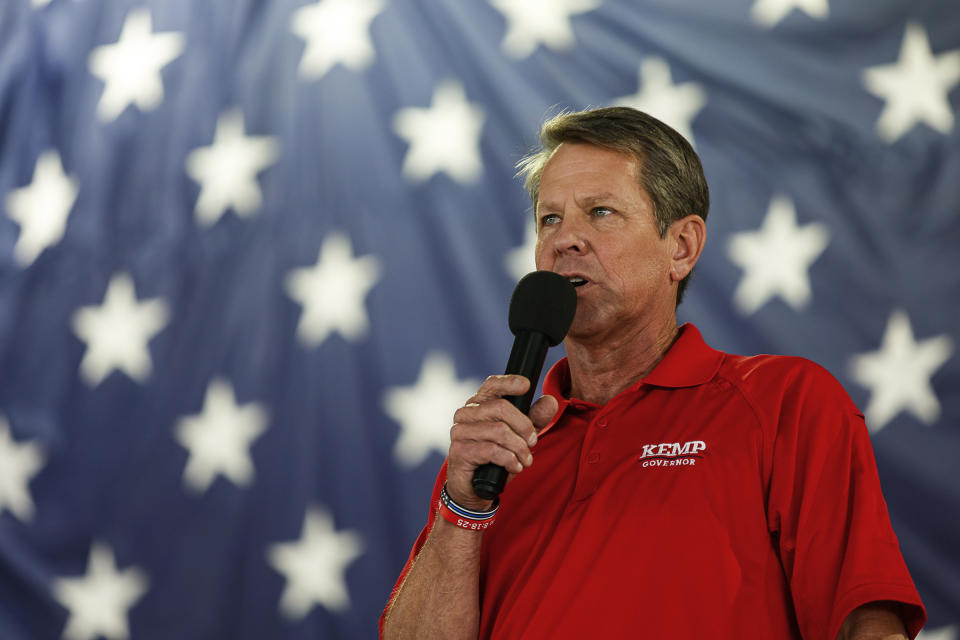 FILE - Georgia Gov. Brian Kemp speaks during the 17th annual Floyd County GOP Rally at the Coosa Valley Fairgrounds on Saturday, Aug. 7, 2021 in Rome, Ga. Kemp issued an executive order Thursday, Aug. 19 that bans cities from requiring businesses to enforce local restrictions aimed at curbing the coronavirus pandemic, but what impact, if any, the measure would have on new mask requirements in Atlanta, Savannah and other cities was not clear. (Troy Stolt/Chattanooga Times Free Press via AP, File)