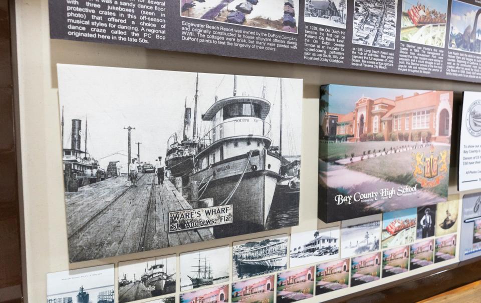 An exhibit providing a photo tour of Bay County history is now on display at the Bay County Historical Museum. One of the old black and white photos show a scene from Ware's Wharf in St. Andrews.