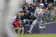 St. Louis Cardinals' Tyler O'Neill makes a running catch during the fourth inning of a baseball game against the Milwaukee Brewers Tuesday, Sept. 21, 2021, in Milwaukee. (AP Photo/Aaron Gash)