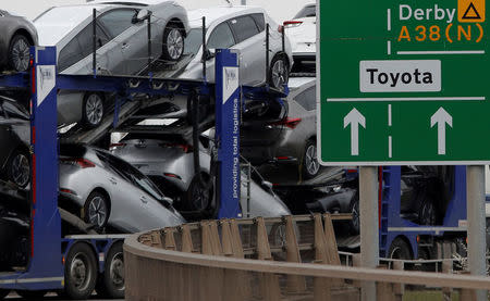 FILE PHOTO: New Toyota cars are transported from their manufacturing facility in Burnaston, Britain March 16, 2017. REUTERS/Darren Staples/File Photo