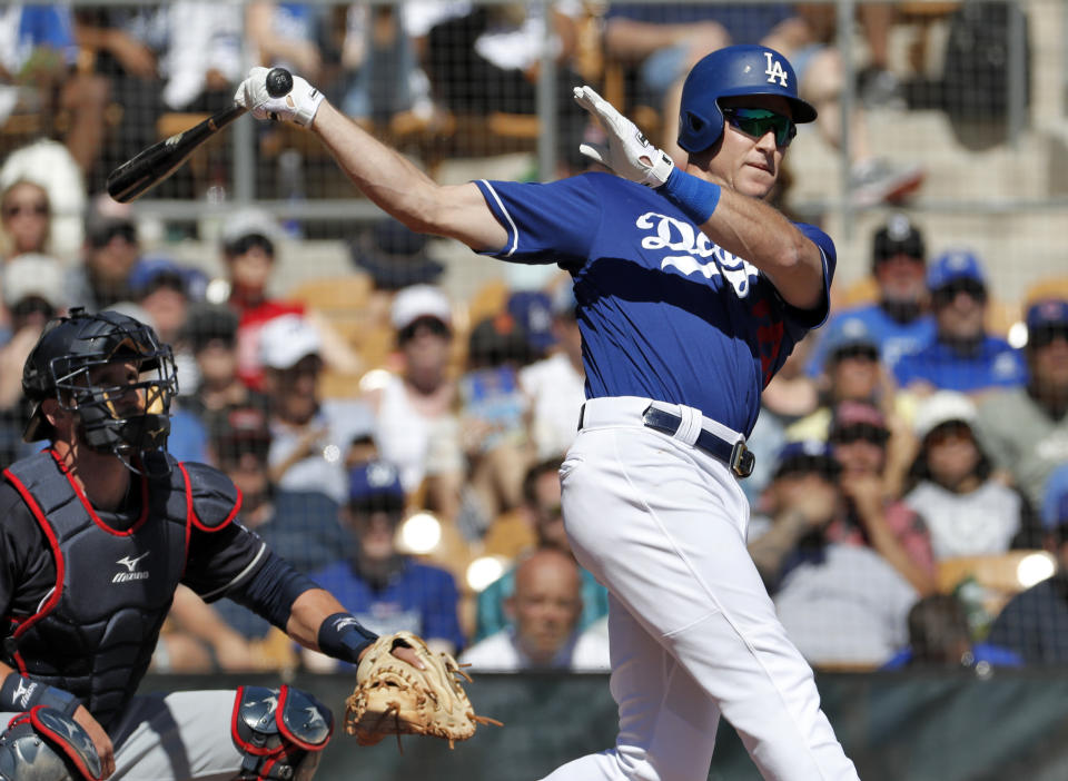 Dodgers' infielder Chase Utley recently reunited with a cancer survivor he met 12 years ago who is now his Dodgers teammate. (AP)