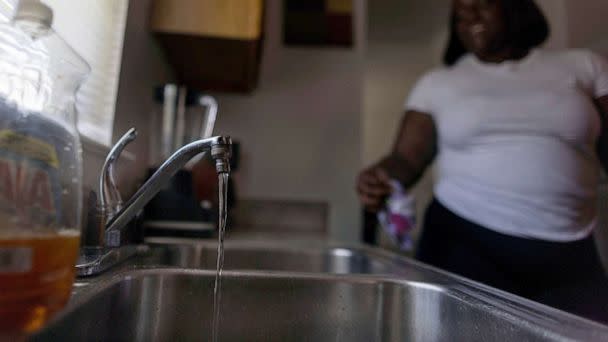 PHOTO: Water is seen running from a faucet in Jackson, Mississippi, Sept. 1, 2022. (Carlos Barria/Reuters)