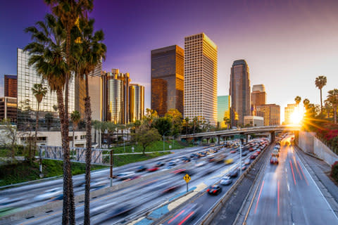 Traffic on a motorway in Los Angeles - Credit: AP