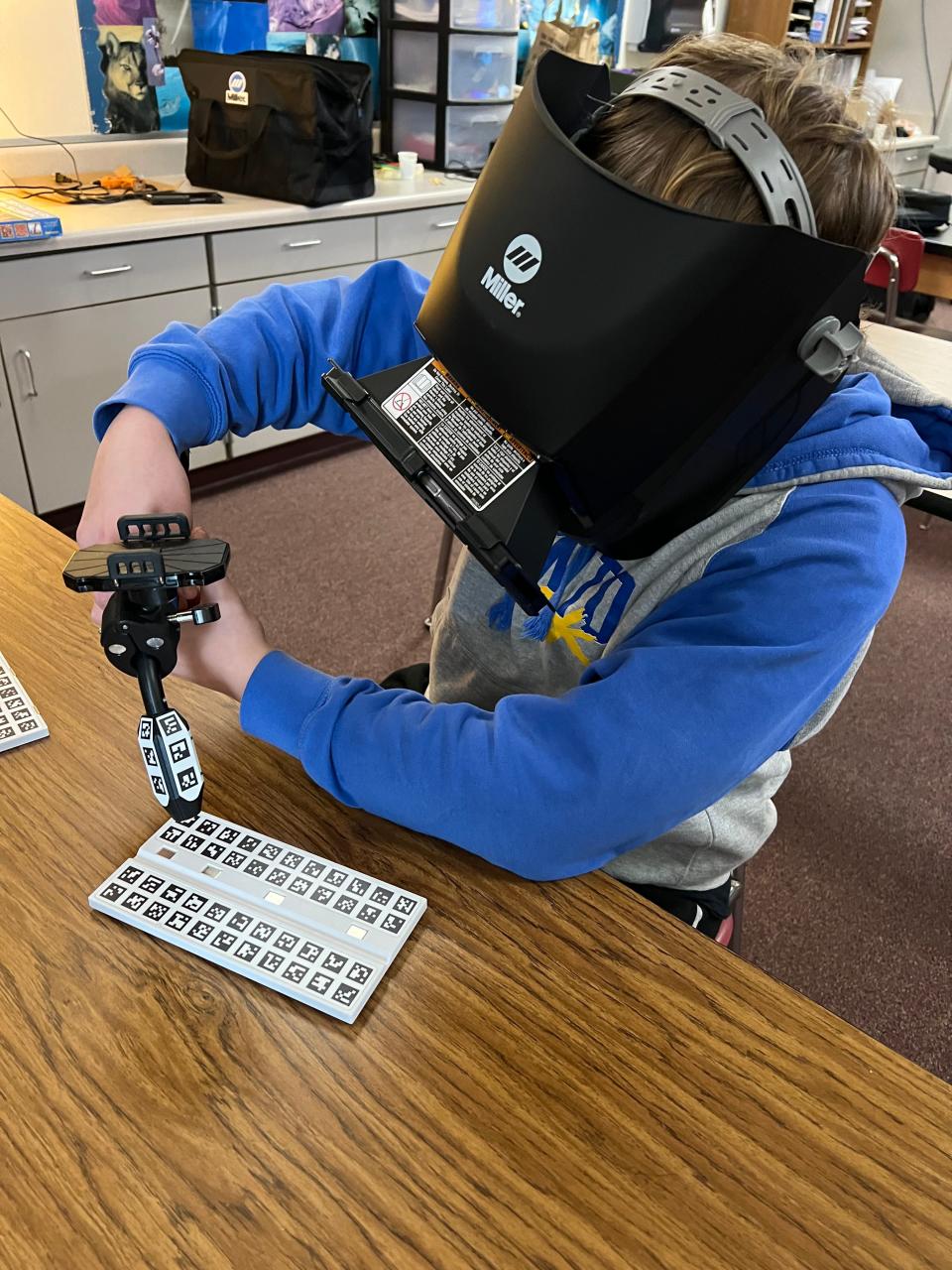 An Oconto Middle School student uses a virtual welder to learn about the skill without dangers from electric shock, burns, eye injuries and infrared radiation exposure.