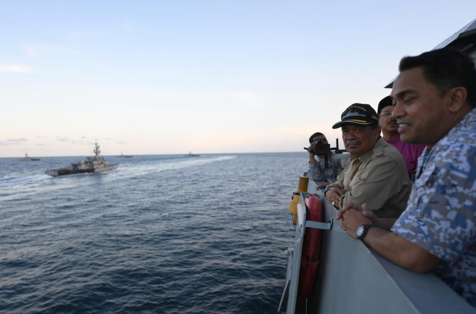 Defence Minister Mohamad Sabu watches a naval exercise aboard the KD Pahang in the waters off Kuantan May 27, 2019. — Bernama pic