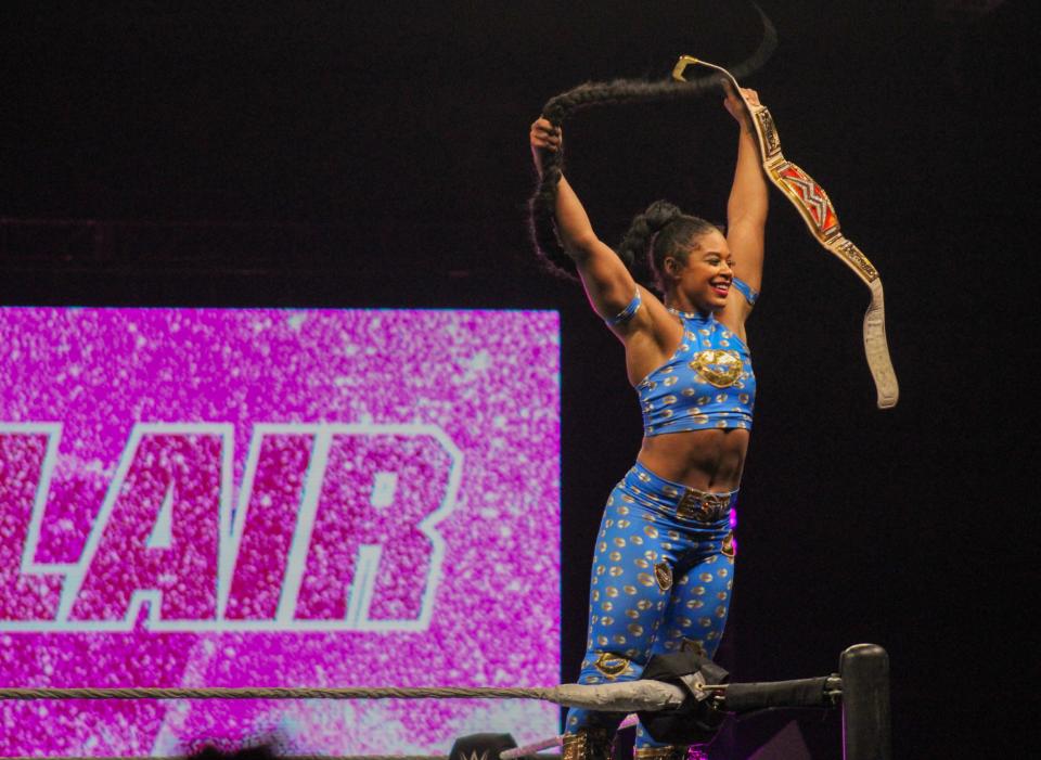 Bianca Belair poses to the crowd during the WWE Saturday Night's Main Event house show in the Amarillo Civic Center on Saturday, June 25, 2022.