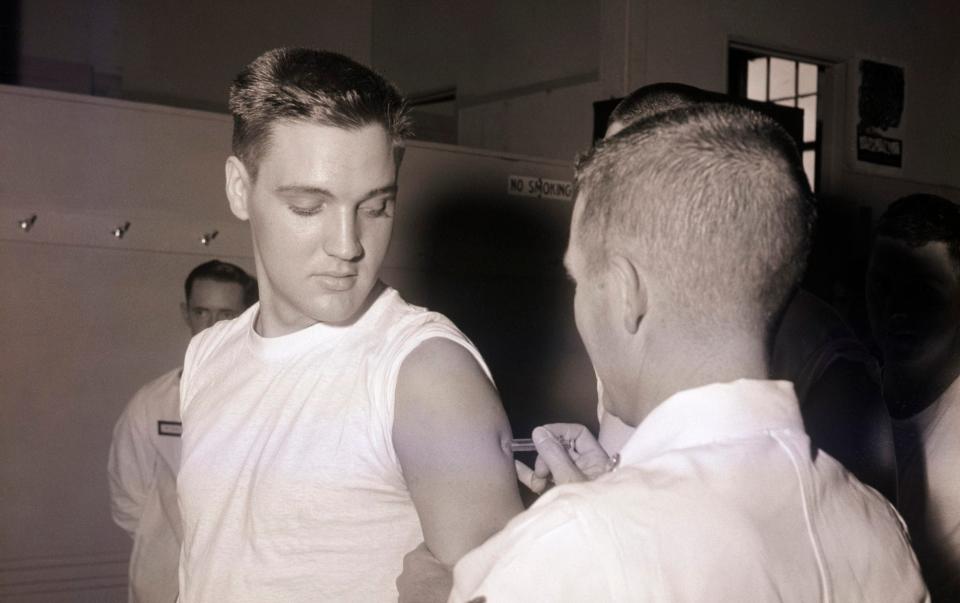 Jabbed: Elvis receiving a vaccination, 1958 - Bettmann