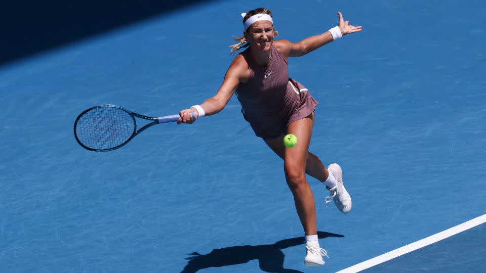Azarenka reaches for a forehand against Yastremenka at the Australian Open, where she was aiming to win a third grand slam title. - David Gray/AFP/Getty Images