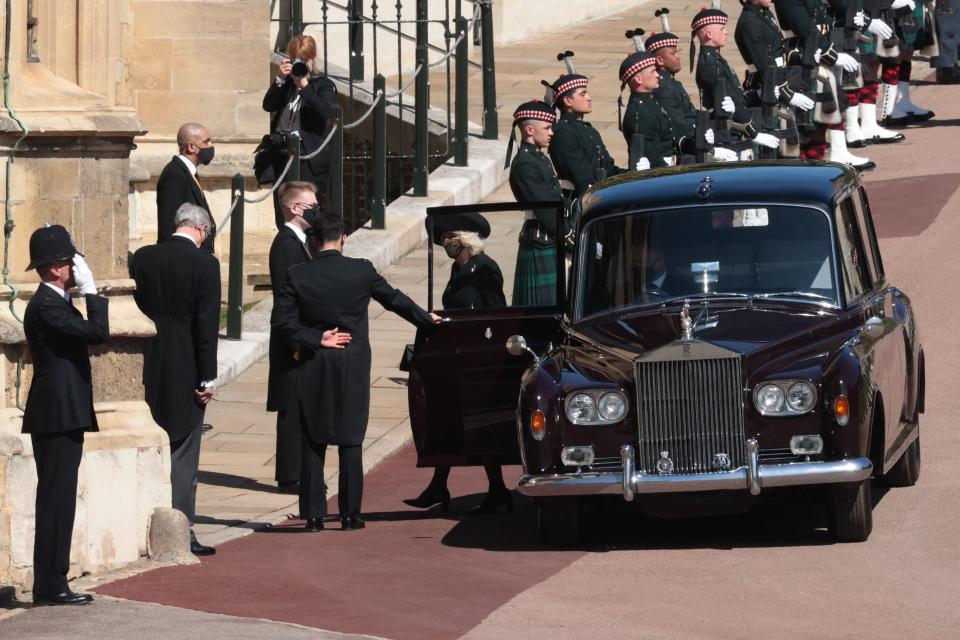 Britain's Camilla, Duchess of Cornwall arrives for the funeral service of Britain's Prince Philip, Duke of Edinburgh inside St George's Chapel in Windsor Castle in Windsor, west of London, on April 17, 2021. - Philip, who was married to Queen Elizabeth II for 73 years, died on April 9 aged 99 just weeks after a month-long stay in hospital for treatment to a heart condition and an infection. (Photo by HANNAH MCKAY / POOL / AFP) (Photo by HANNAH MCKAY/POOL/AFP via Getty Images)