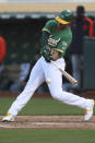 Oakland Athletics' Matt Olson singles against the Detroit Tigers during the second inning of a baseball game in Oakland, Calif., Friday, April 16, 2021. (AP Photo/Jed Jacobsohn)