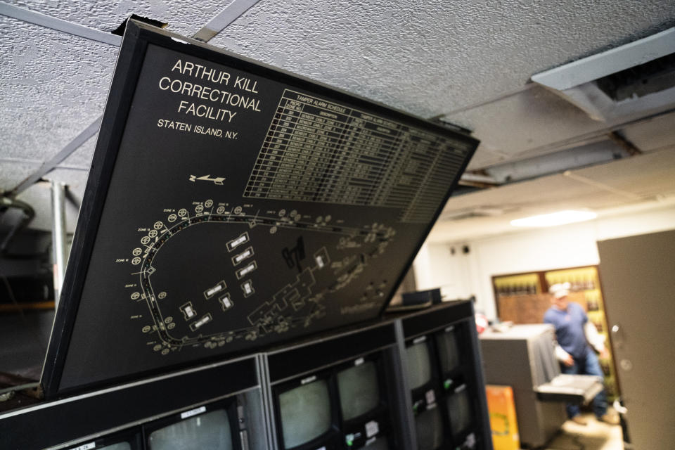 A decommissioned video surveillance system remains in the main guard tower at the former Arthur Kill Correctional Facility, Tuesday, May 11, 2021, in the Staten Island borough of New York. The facility was purchased by Broadway Stages in 2017 and has been transformed into a film and television studio. Much of the prison was preserved as a set, lending authenticity to scenes in productions. Five other sound stages are being built on the 69-acre site, giving production companies the ability to shoot entire projects. (AP Photo/John Minchillo)