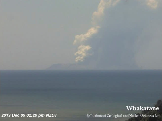 Smoke bellows from Whakaari, also known as White Island, volcano as it erupts in New Zealand