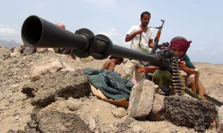 A fighter from the Southern Popular Resistance mans a machine gun at the front line of fighting against Houthi fighters, on the outskirts of Yemen's southern port city of Aden June 6, 2015. REUTERS/Stringer/Files