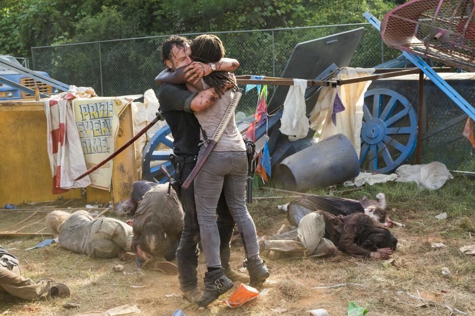 Michonne hugs Rick at fair field