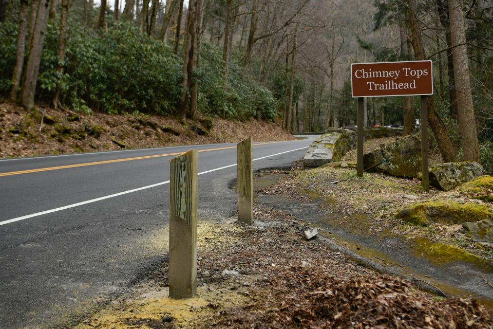Newly installed roadside wooden posts are designed to deter roadside parking near the Chimney Tops trailhead.