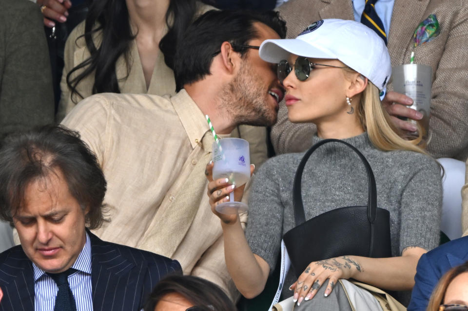 LONDON, ENGLAND - JULY 16: Jonathan Bailey and Ariana Grande watch Carlos Alcaraz vs Novak Djokovic in the Wimbledon 2023 men&#39;s final on Centre Court during day fourteen of the Wimbledon Tennis Championships at the All England Lawn Tennis and Croquet Club on July 16, 2023 in London, England. (Photo by Karwai Tang/WireImage)