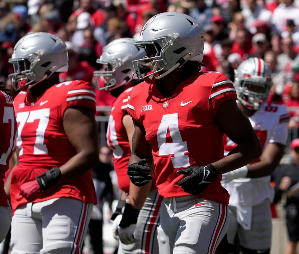 April 13, 2024; Columbus, Ohio, USA; 
Ohio State Buckeyes wide receiver Jeremiah Smith (4) competes during the first half of the LifeSports spring football game at Ohio Stadium on Saturday.