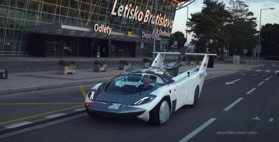 The AirCar is filled with fuel at a regular petrol station (Klein Vision/PA)