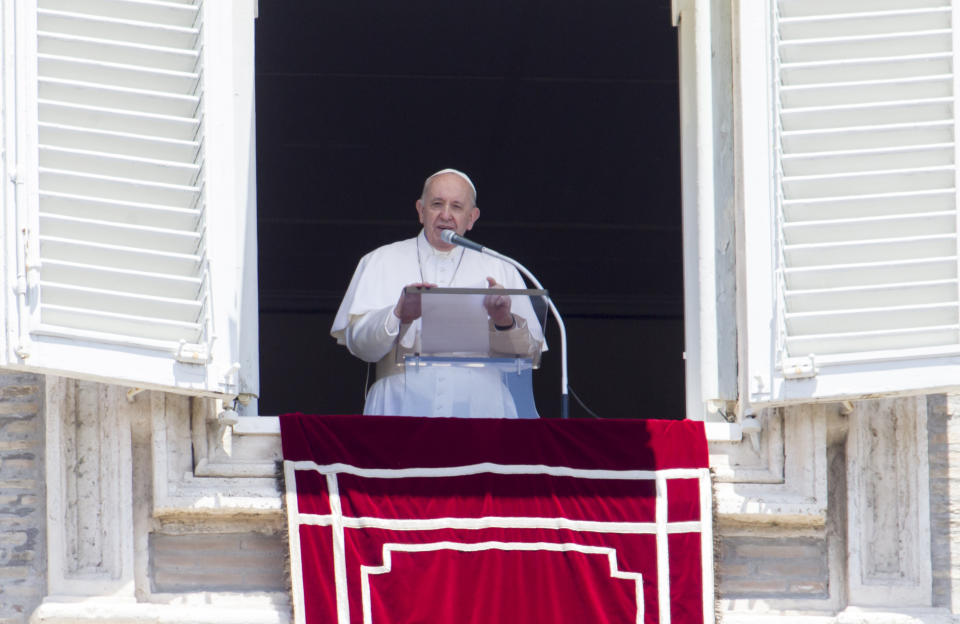Pope Francis speaks during the Angelus prayer from his studio window overlooking St. Peter's Square, after celebrating a Mass for the Feast of Rome's Patrons Saints Peter and Paul, at the Vatican, Monday, June 29, 2020. (AP Photo/Riccardo De Luca)